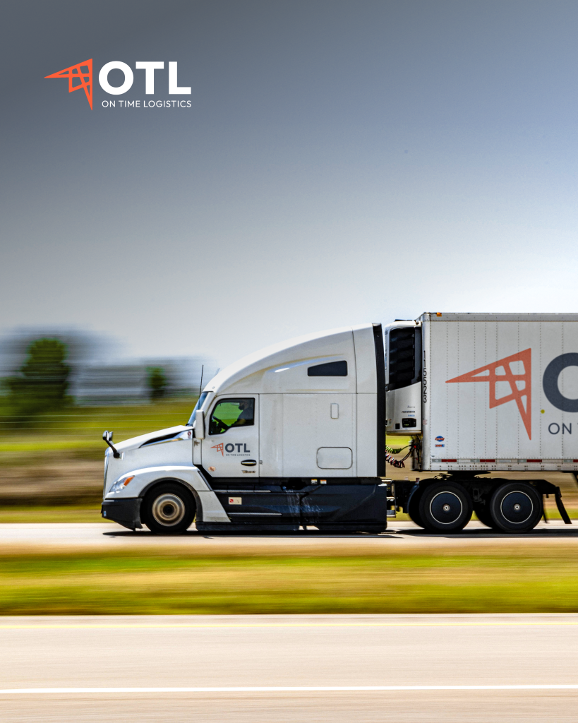 Semi-truck transporting freight on a highway representing warehouse logistics and supply chain operations.